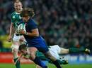 Dimitri Szarzewski of France evades the tackle of Luke Fitzgerald of Ireland