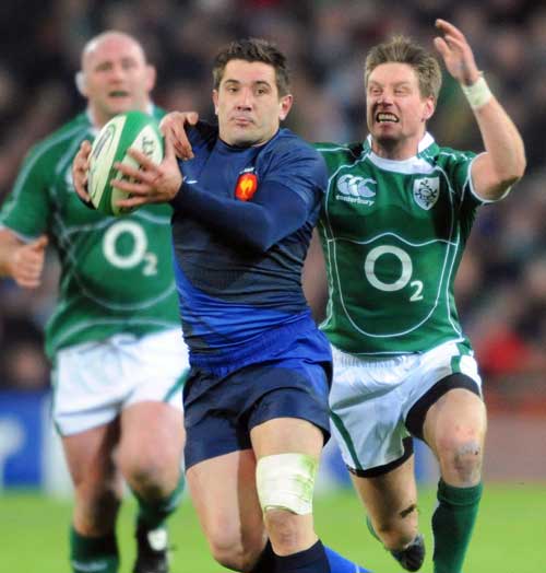 France's center Florian Fritz vies with Ireland's fly half Ronan O'Gara