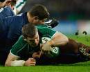 Gordon D'Arcy of Ireland dives over to score his try