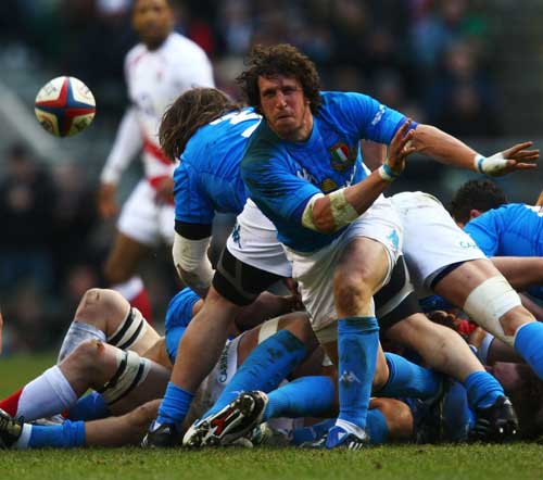 Italy's Mauro Bergamasco passes the ball out of a ruck