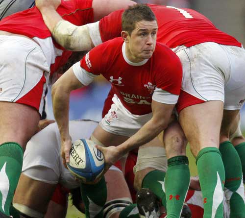 Wales' Shane Williams releases the ball against Scotland