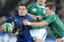 France centre Florian Fritz contends with Ireland fly-half Ronan O'Gara