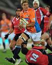 The Cheetahs' Juan Smith forces an opening in the Lions' defence