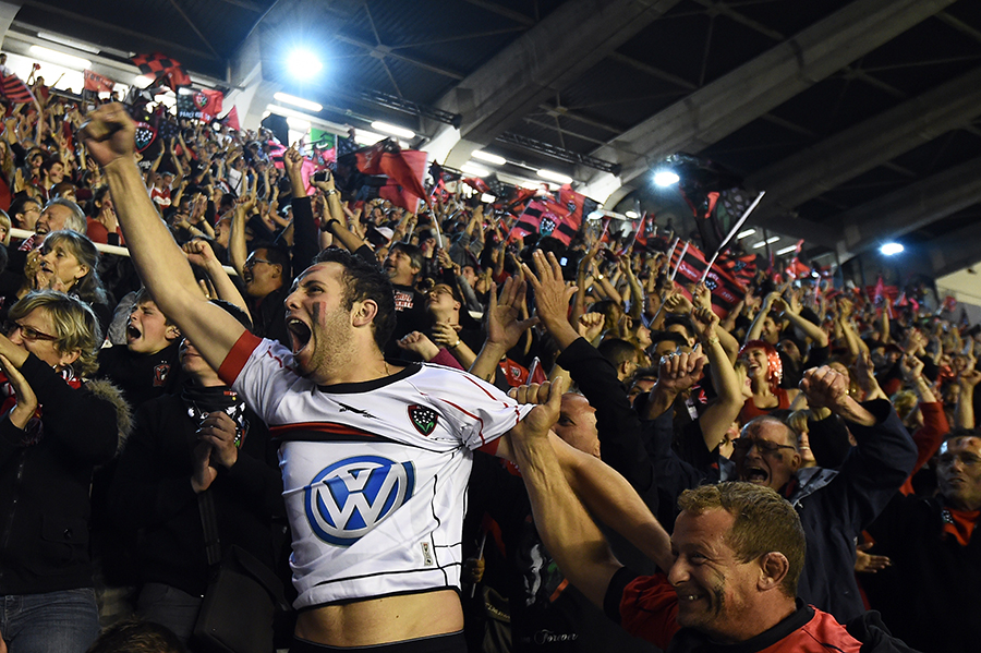 Toulon supporters celebrate back home in Stade Mayol as their team wins at the Stade de France