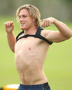 Michael Hooper puts on his GPS during a training session
