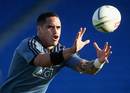 New Zealand's Aaron Smith catches a ball during training