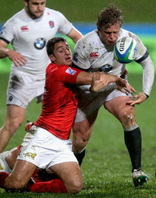 Tom Woolstencroft of England loses possession in the tackle of Bautista Ezcurra, England v Argentina, Junior World Championship, North Shore City, June 10, 2014