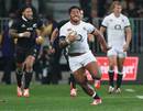 England's Manu Tuilagi breaks clear on the right wing