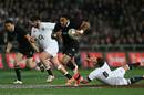 New Zealand's Ma'a Nonu breaks past England's Danny Care