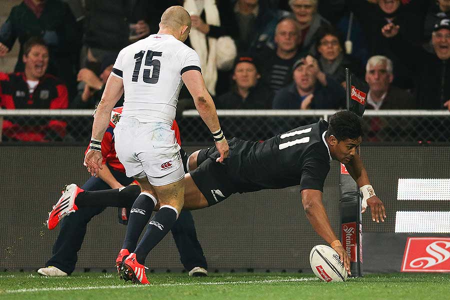 New Zealand's Julian Savea dives over to score a try