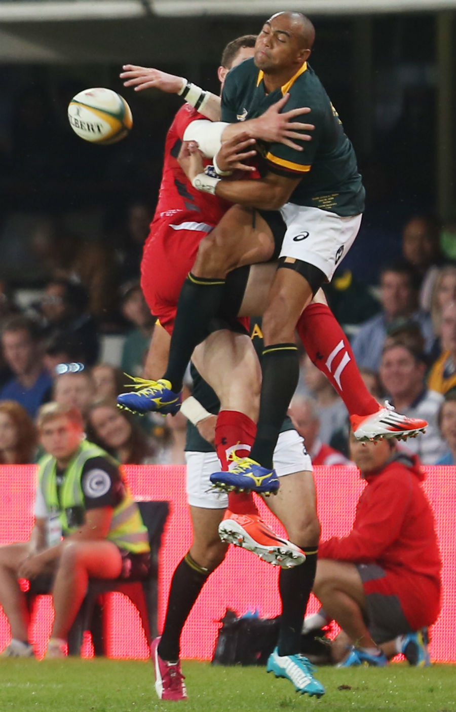 George North and Cornall Hendricks contest - and miss-  a high kick