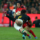 South Africa's Francois Louw goes flying in on Wales' Matthew Morgan