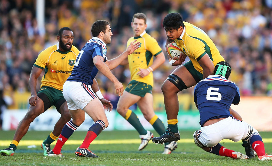 Will Skelton is tackled by Thierry Dusautoir 