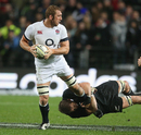 Chris Robshaw is tackled by Richie McCaw