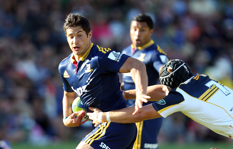 Phil Burleigh attempts to burst through a tackle