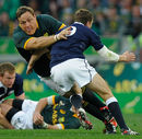 Coenie Oosthuizen is tackled 