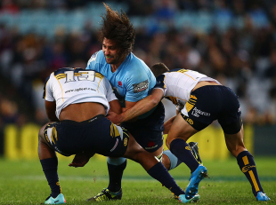 Tevita Kuridrani is knocked unconscious while attempting to tackle Jacques Potgieter, Waratahs v Brumbies, Super Rugby, ANZ Stadium, Sydney, June 28, 2014