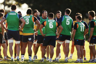 Waratahs coach Michael Cheika talks to players at training, Super Rugby, July 8, 2014