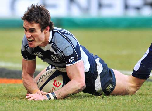 Scotland's Thom Evans crosses for a try against France