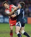 Gloucester's Rory Lawson is tackled by Sale's Neil Briggs