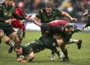 Paul Diggin is tackled by Nick Lloyd of Saracens