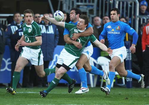 Ireland captain Brian O'Driscoll is tackled by Gonzalo Canale