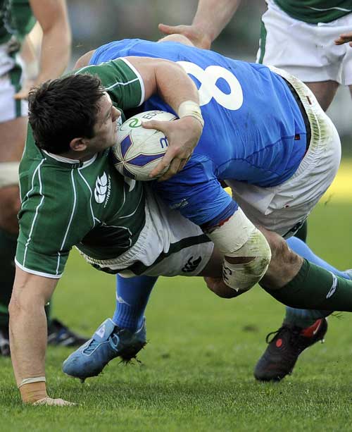 Ireland's David Wallace istackled by Italy's Sergio Parisse