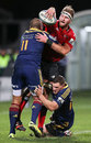 The Crusaders' Kieran Read offloads in a tackle