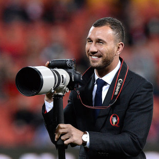 Quade Cooper prepares to photograph some action, Queensland Reds v New South Wales Waratahs, Super Rugby, Suncorp Stadium, Brisbane, July 12, 2014