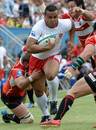 Tonga's Eddie Aholelei goes on the charge