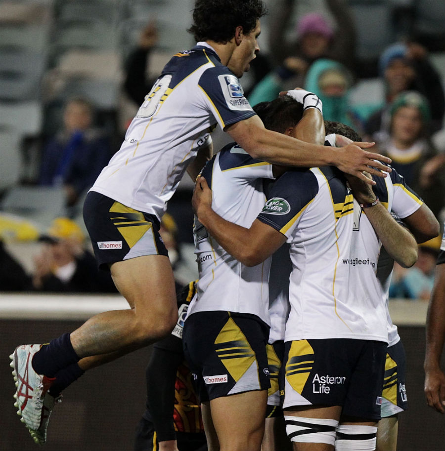 The Brumbies' celebrate Nic White's opening try