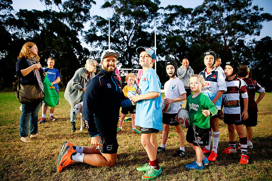 The Waratahs' Adam Ashley-Cooper takes a coaching clinic with Roseville Juniors