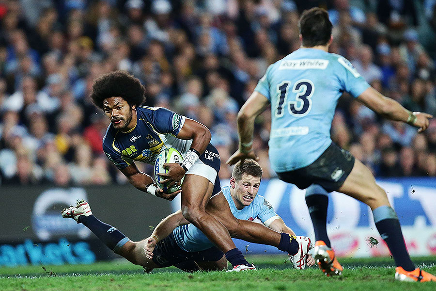 The Brumbies' Henry Speight takes on the Waratahs' defence