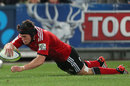 The Crusaders' Matt Todd scores a try