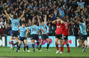 Pure joy. The Waratahs celebrate their first Super Rugby title