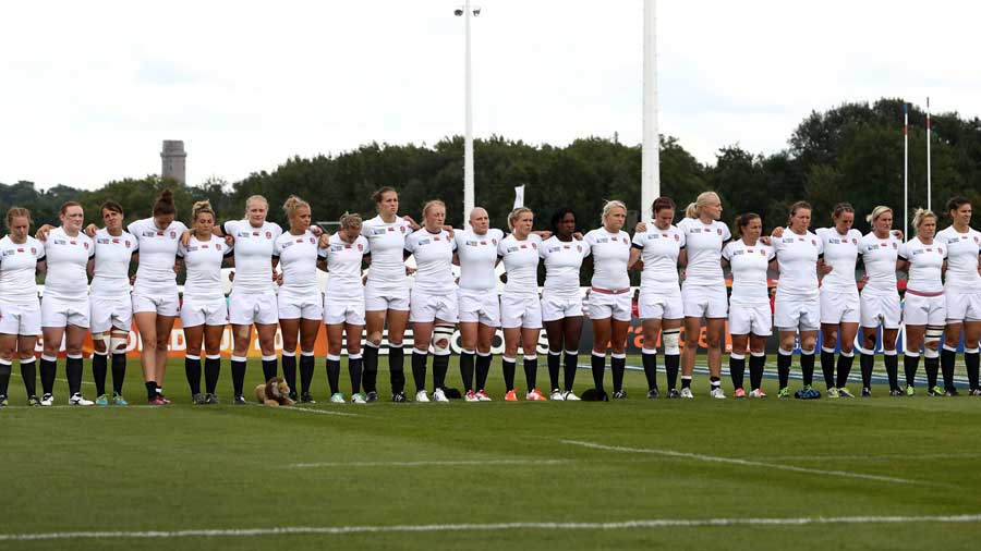 England line up for the anthem against Canada
