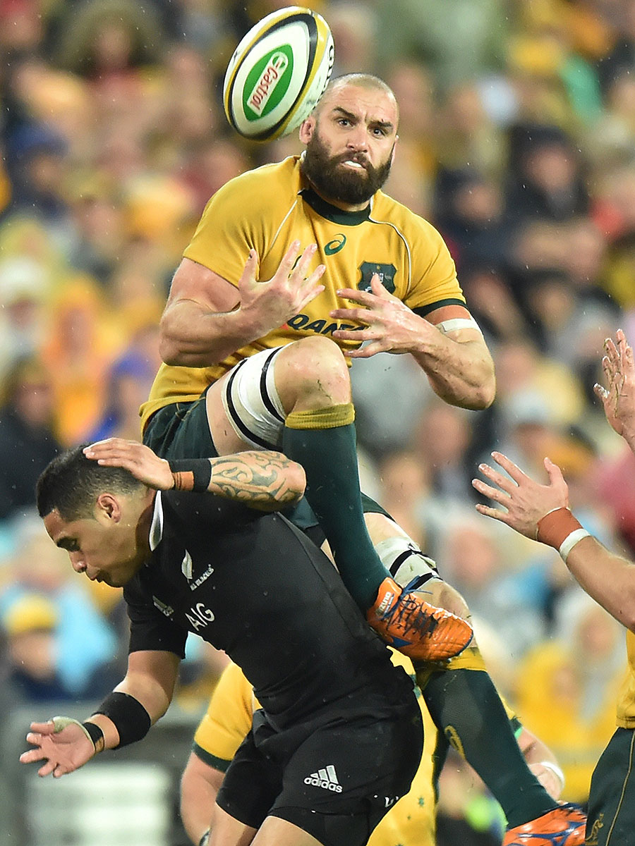 Australia's Scott Fardy wins the ball above New Zealand's Aaron Smith