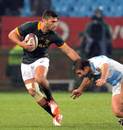 South Africa's Damian de Allande tries to get past the Pumas tackler