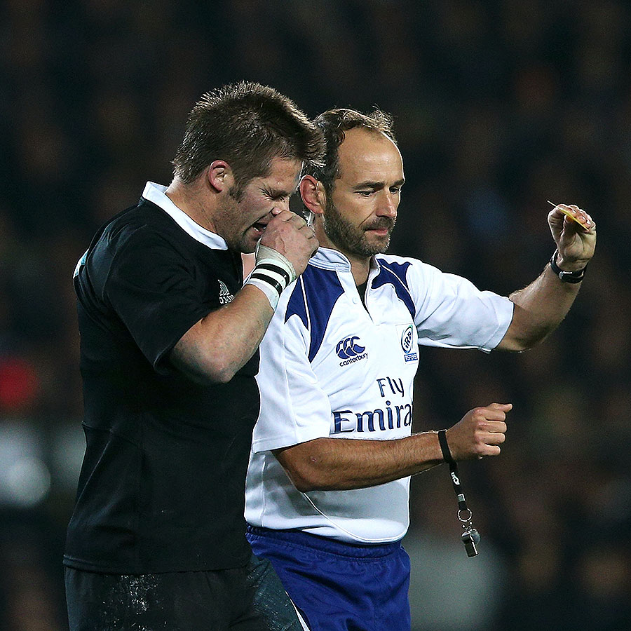 New Zealand's Richie McCaw receives a yellow card