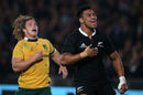 New Zealand's Julian Savea celebrates his try as Michael Hooper fails to catch him