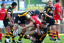 James Haskell tackles Chris Latham in the English Premiership
