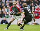 Andy Goode charges at Josh Lewsey