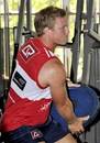 The Reds' Daniel Braid lifts weights during a training session