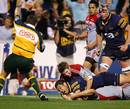 The Brumbies' Mark Gerrard touches down against the Crusaders
