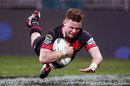 Canterbury's Mitchell Drummond dives to score a try