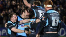 Glasgow Warriors celebrate at the final whistle