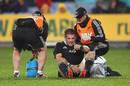 New Zealand's Richard McCaw receives attention from the trainers