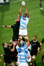 Argentina's Mariano Galarza wins the ball against Kieran Read at the lineout