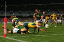 Wallabies' winger Adam Ashley-Cooper drops the ball after diving over the tryline