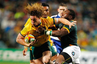 Wallabies' captain Michael Hooper crashes through the Springboks defence, Australia v South Africa, Rugby Championship, Pattersons Stadium, September 6, 2014
